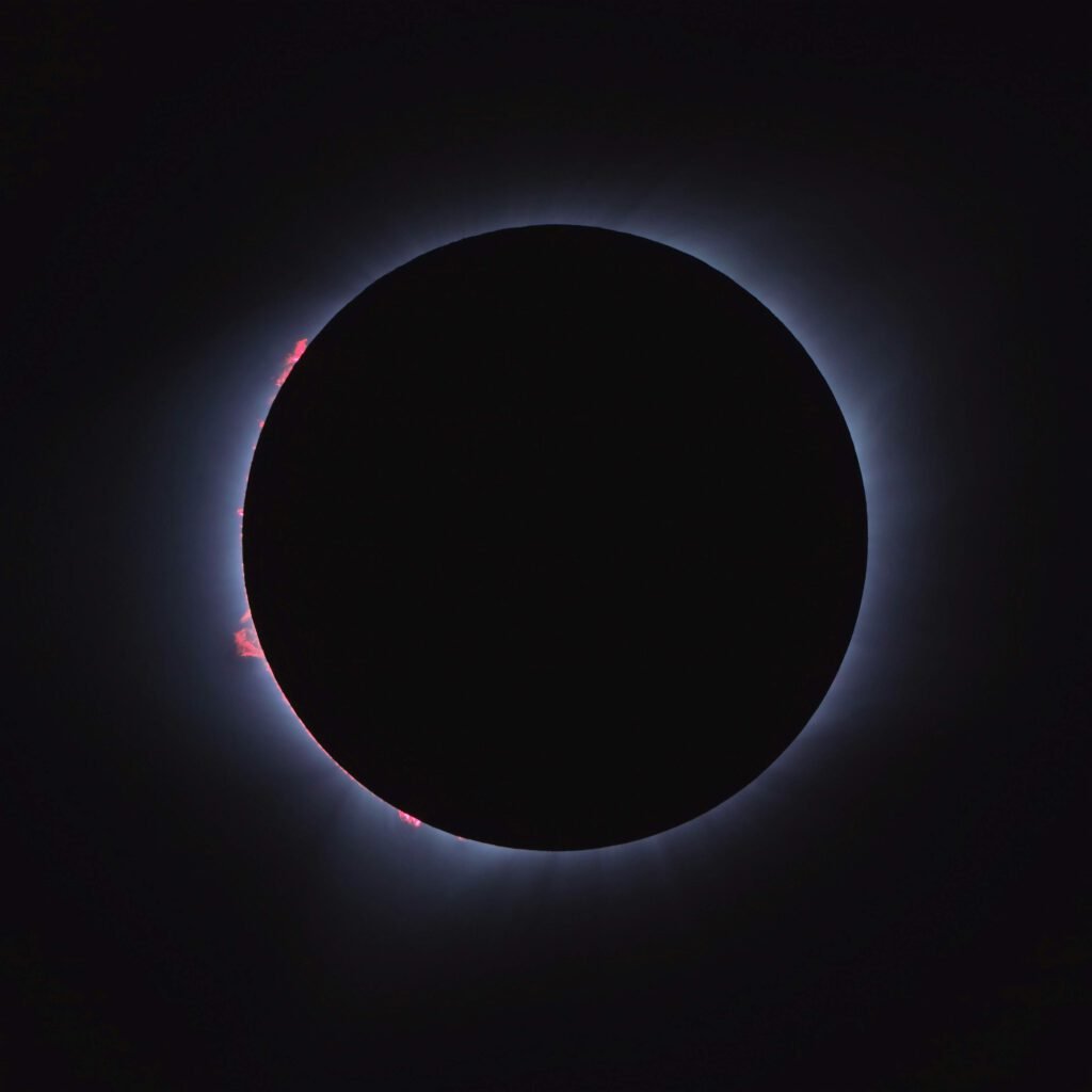 the moon convers the sun in darkness during a total eclipse